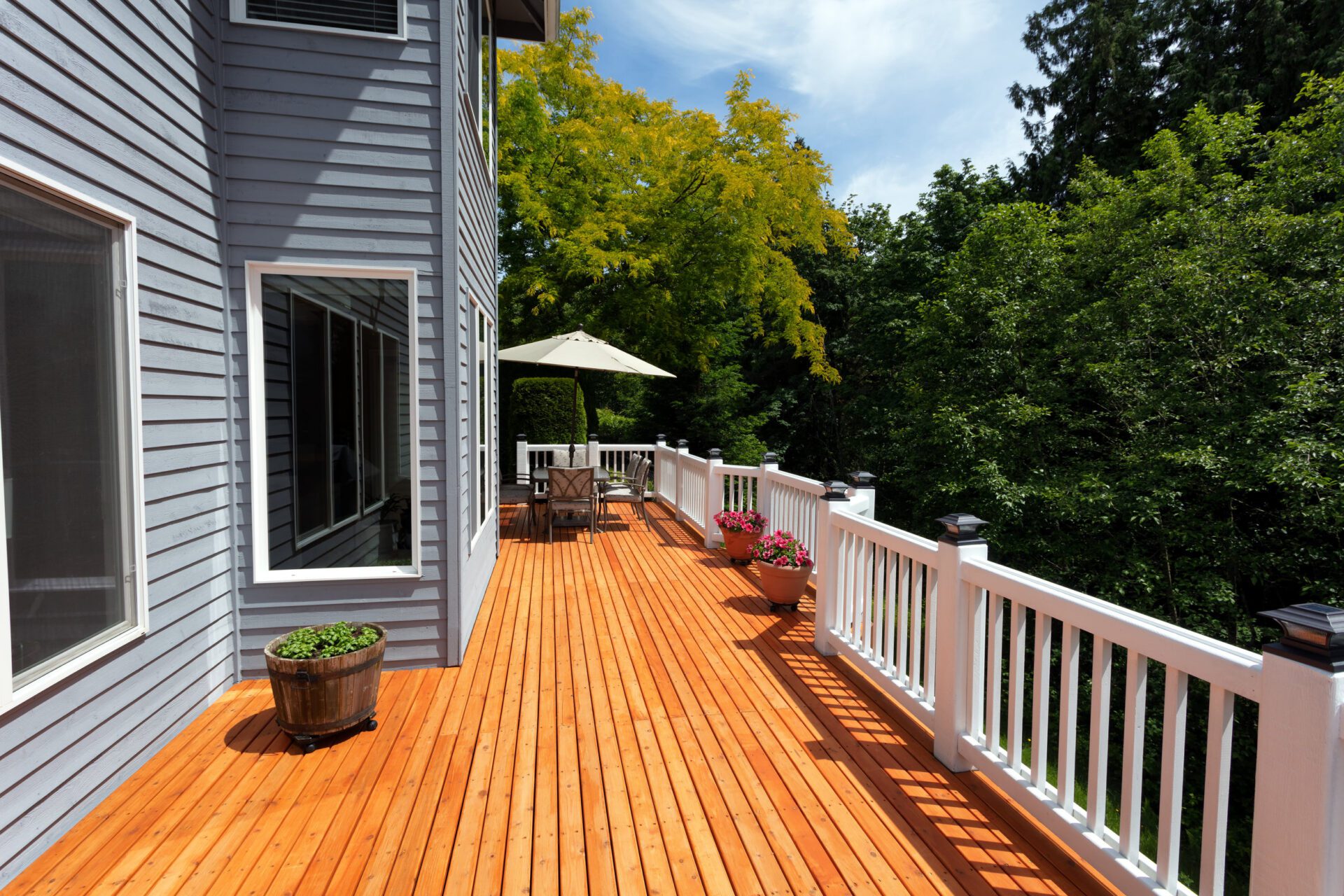 Brand new red cedar outdoor wooden deck during nice day Brand new red cedar outdoor wooden deck during nice day