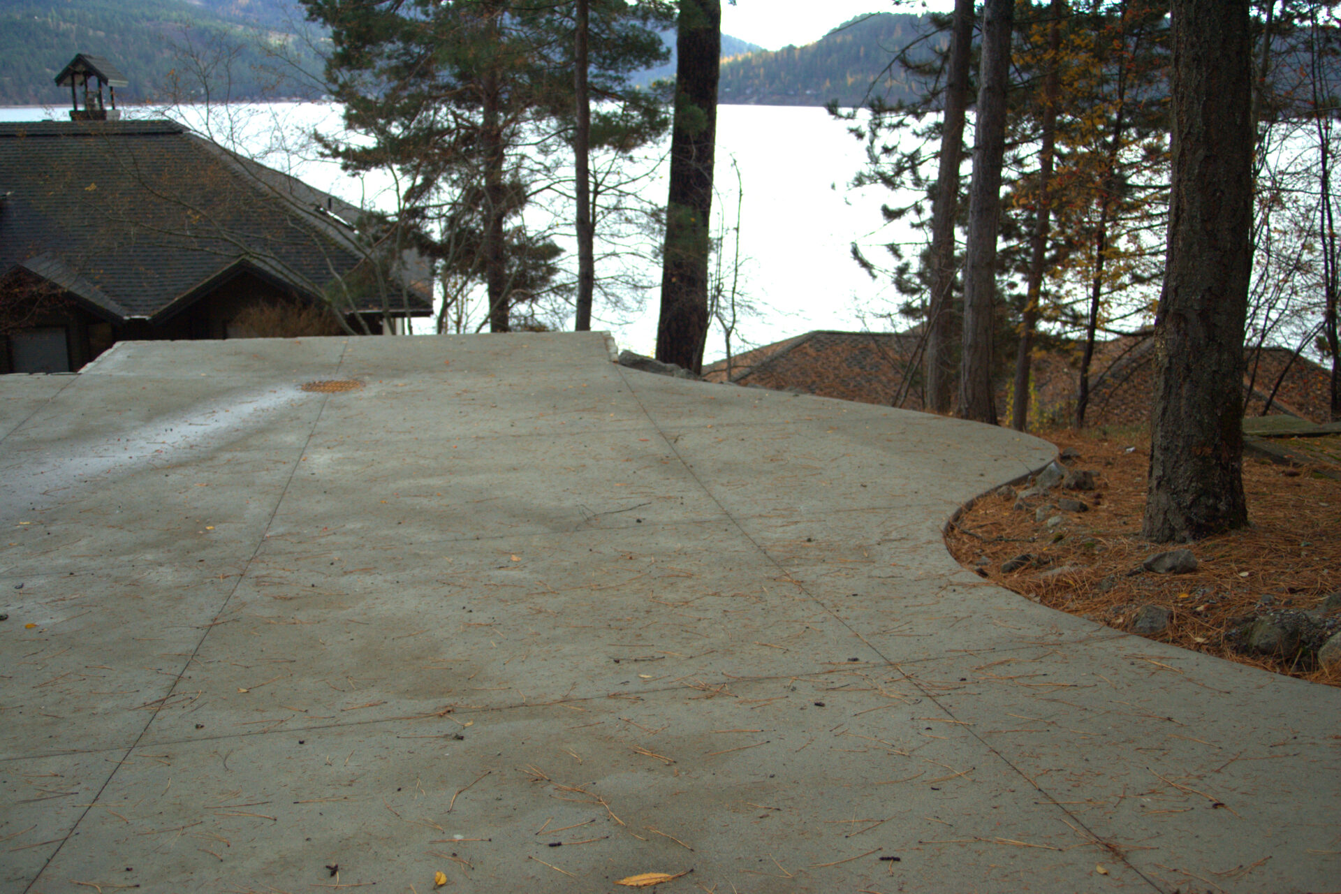 Concrete driveway installed in Stanton by Blue Sky Decks hardscape team.