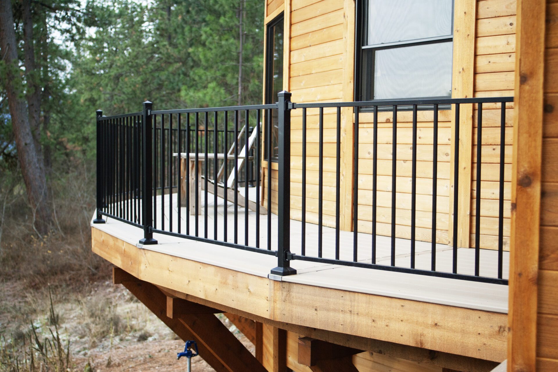 Custom elevated deck construction at Happy Hill Yurt by Blue Sky Decks.