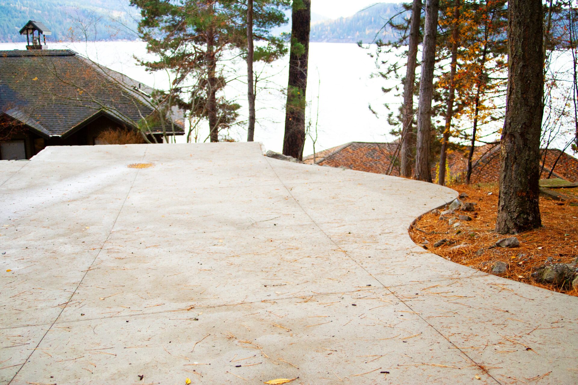 Concrete driveway installed in Stanton by Blue Sky Decks hardscape team.