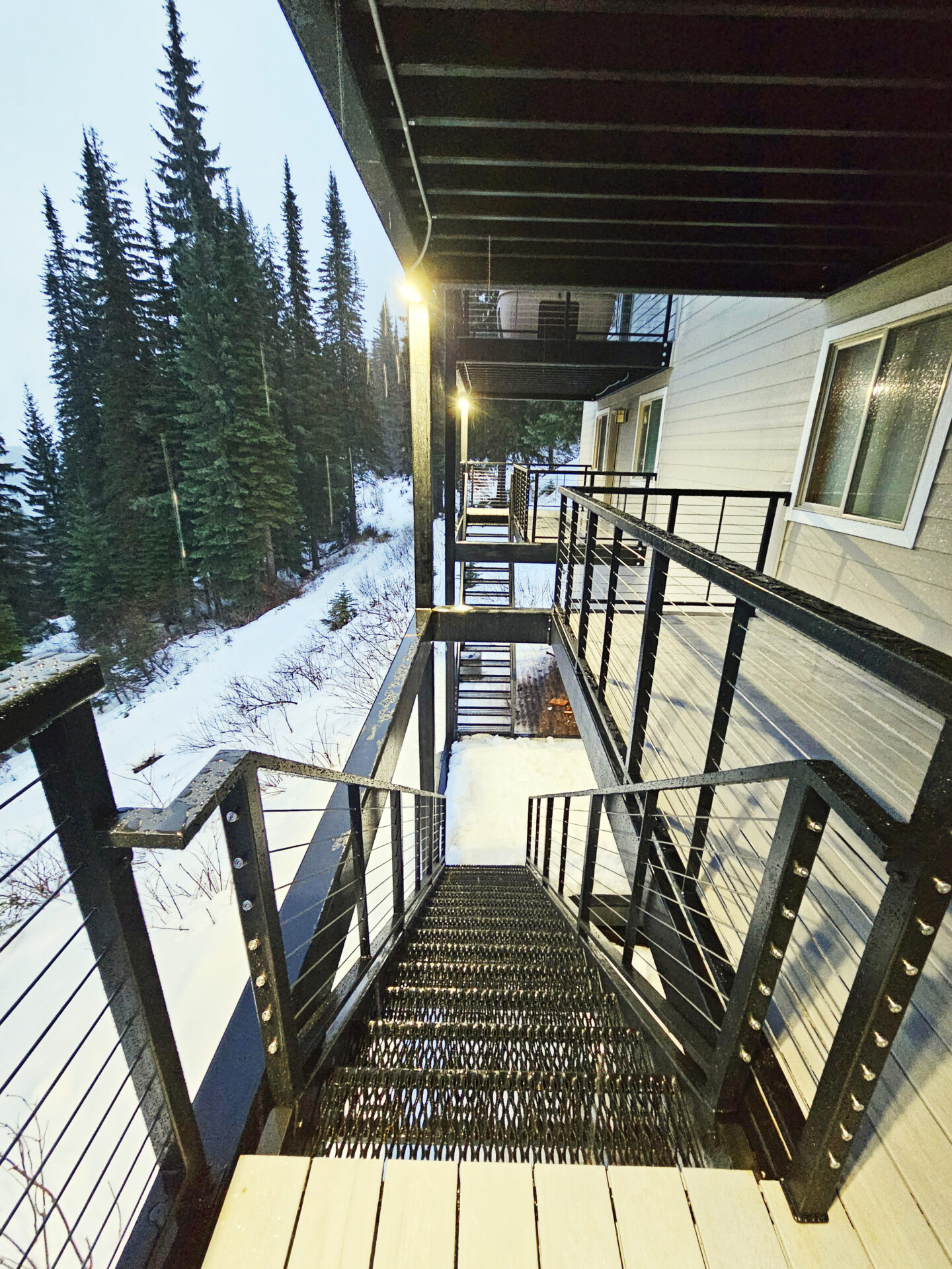 Custom multi-story deck construction by Blue Sky Decks at Schweitzer Ski House.